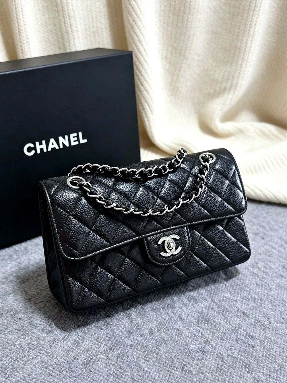 CHANEL Classic Flap Bag in Black Caviar Leather